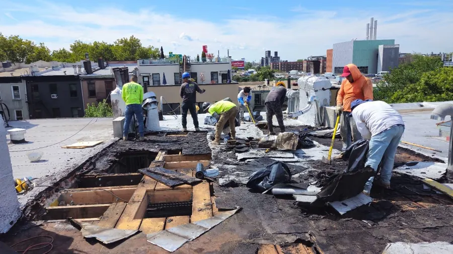 NY Best Roofer crew responding fast to an urgent roof replacement in New York City